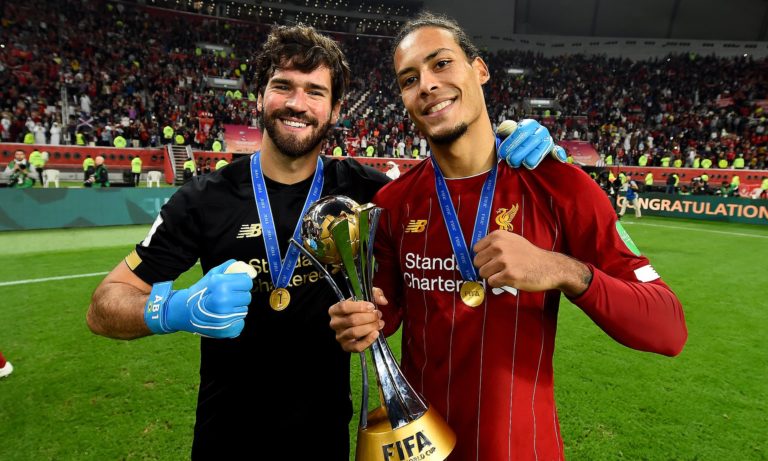 Alisson Becker and Virgil van Dijk