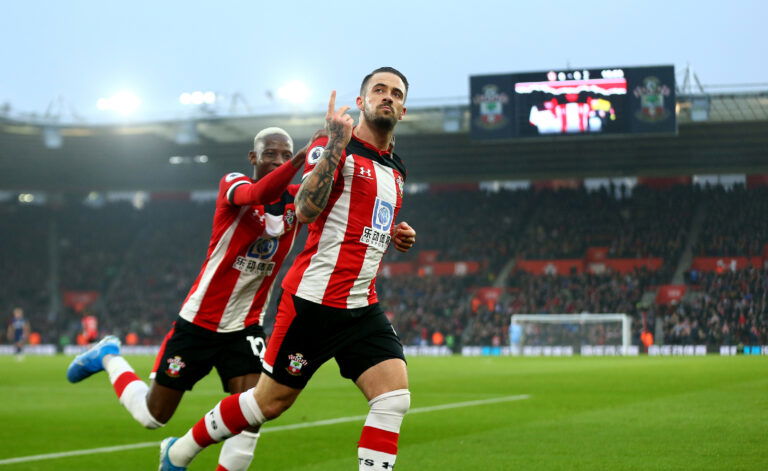 SOUTHAMPTON, ENGLAND - JANUARY 01: Danny Ings(R) of Southampton celebrates with Moussa Djenepo(L) after scoring during the Premier League match between Southampton FC and Tottenham Hotspur at St Mary's Stadium on January 01, 2020 in Southampton, United Kingdom.