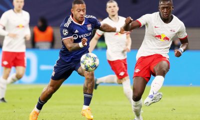 LEIPZIG,GERMANY,02.OCT.19 - SOCCER - UEFA Champions League, group stage, RasenBallsport Leipzig vs Olympique Lyon. Image shows Memphis Depay (Lyon) and Ibrahima Konate.
