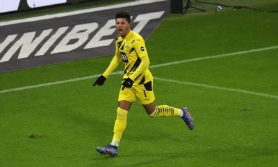 LEIPZIG, GERMANY - JANUARY 09: Jadon Sancho of Borussia Dortmund celebrates after scoring their team's first goal during the Bundesliga match between RB Leipzig and Borussia Dortmund at Red Bull Arena on January 09, 2021 in Leipzig, Germany.
