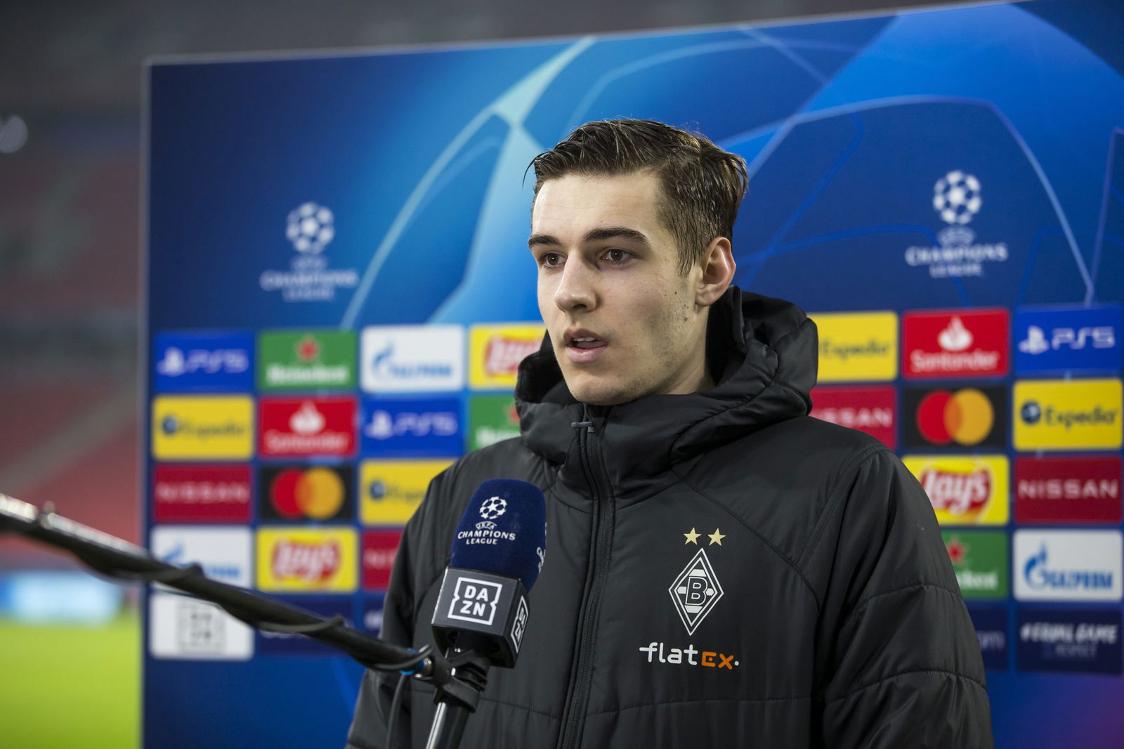 BUDAPEST, HUNGARY - FEBRUARY 24: Florian Neuhaus of Borussia Moenchengladbach talks to the media after the UEFA Champions League Round Of 16 Leg One match between Borussia Moenchengladbach and Manchester City at Puskas Arena on February 24, 2021 in Budapest, Hungary.