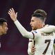 Roma's Italian midfielder Lorenzo Pellegrini (R) celebrates with teammates after scoring a goal during the UEFA Europa League quarter-final football match between Ajax Amsterdam and AS Roma at the Johan Cruijff Arena in Amsterdam on April 8, 2021.