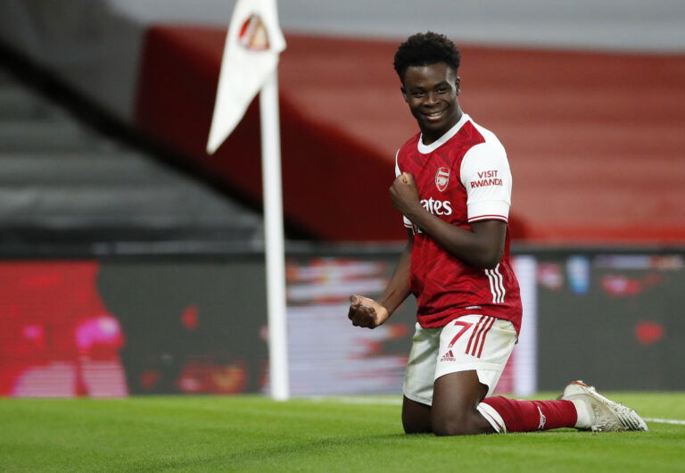 LONDON, ENGLAND - DECEMBER 26: Bukayo Saka of Arsenal celebrates after scoring his team's third goal during the Premier League match between Arsenal and Chelsea at Emirates Stadium on December 26, 2020 in London, England.