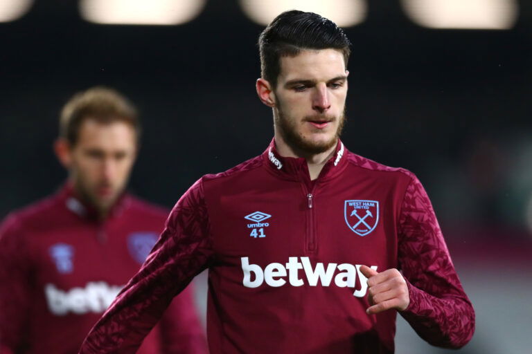 LONDON, ENGLAND - FEBRUARY 06: Declan Rice of West Ham United warms up prior to the Premier League match between Fulham and West Ham United at Craven Cottage on February 06, 2021 in London, England.