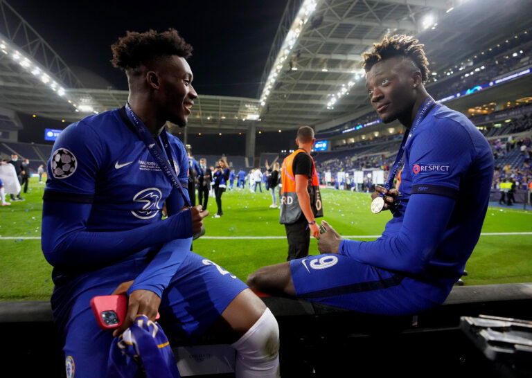 PORTO, PORTUGAL - MAY 29: Callum Hudson-Odoi and Tammy Abraham of Chelsea hold their winners medals following their side's victory in the UEFA Champions League Final between Manchester City and Chelsea FC at Estadio do Dragao on May 29, 2021 in Porto, Portugal.