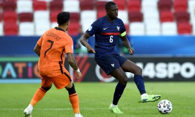 BUDAPEST, HUNGARY - MAY 31: Ibrahima Konate of France controls the ball whilst under pressure from Justin Kluivert of Netherlands during the 2021 UEFA European Under-21 Championship Quarter-finals match between Netherlands and France at Bozsik Stadion on May 31, 2021 in Budapest, Hungary.