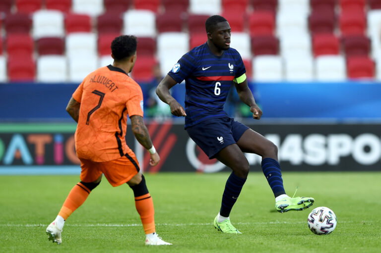 BUDAPEST, HUNGARY - MAY 31: Ibrahima Konate of France controls the ball whilst under pressure from Justin Kluivert of Netherlands during the 2021 UEFA European Under-21 Championship Quarter-finals match between Netherlands and France at Bozsik Stadion on May 31, 2021 in Budapest, Hungary.