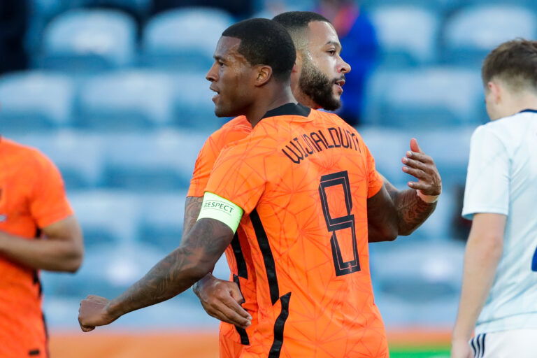 ALMANCIL, PORTUGAL - JUNE 2: Memphis Depay of Netherlands celebrates after scoring his sides first goal with Georginio Wijnaldum of Netherlands during the International Friendly match between Netherlands and Scotland at Algarve Stadium on June 2, 2021 in Almancil, Portugal.