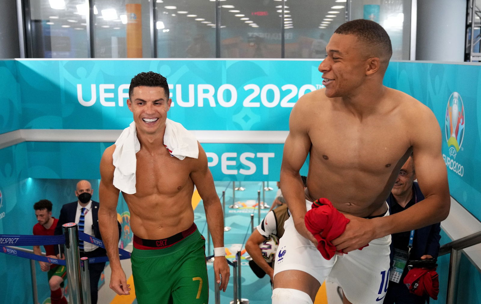 BUDAPEST, HUNGARY - JUNE 23: Cristiano Ronaldo of Portugal speaks with Kylian Mbappe of France in the tunnel following the UEFA Euro 2020 Championship Group F match between Portugal and France at Puskas Arena on June 23, 2021 in Budapest, Hungary.