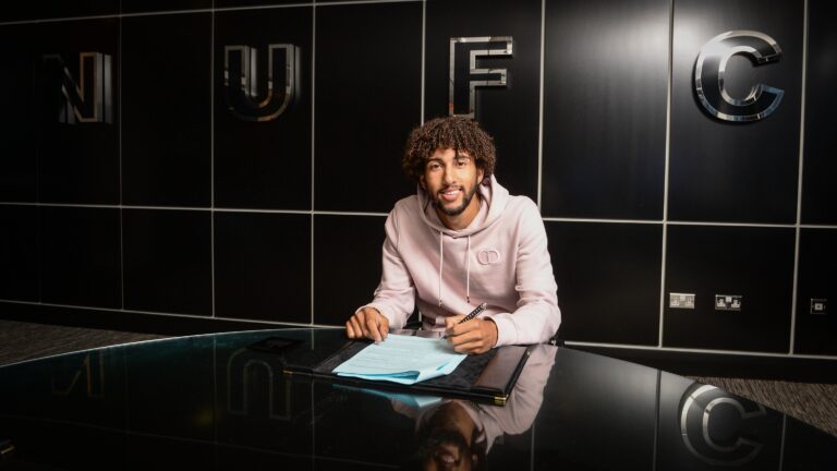 NEWCASTLE UPON TYNE, ENGLAND - JUNE 25: Remi Savage poses for Photographs after signing for Newcastle United at St.James’ Park on June 25, 2021 in Newcastle upon Tyne, England.