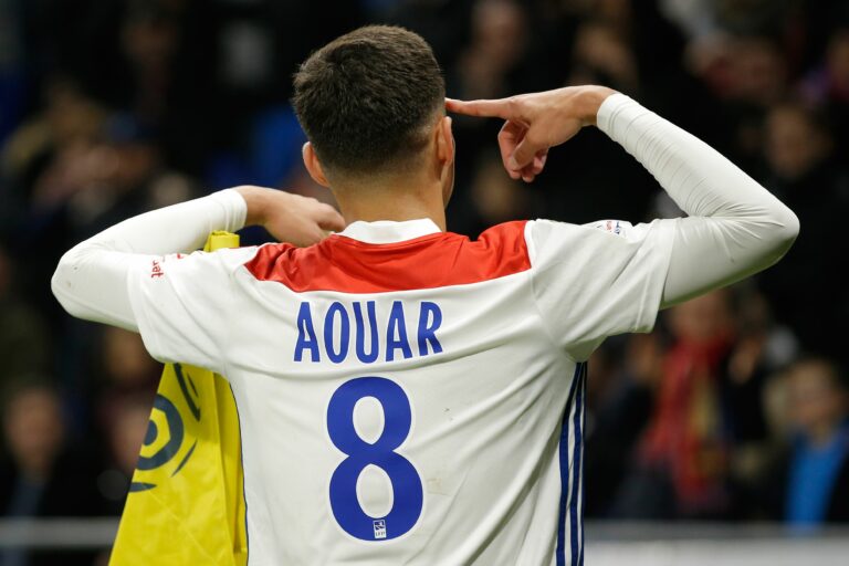 Lyon's French midfielder Houssem Aouar reacts after scoring a goal during the French L1 football match between Olympique Lyonnais and Girondins de Bordeaux on November 3, 2018, at the Groupama Stadium in Decines-Charpieu, central eastern France.