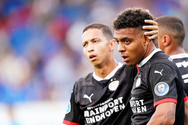 TILBURG, NETHERLANDS - AUGUST 21: Donyell Malen of PSV celebrates 0-1 with Mauro Junior of PSV during the Club Friendly match between Willem II v PSV at the Koning Willem II Stadium on August 21, 2020 in Tilburg Netherlands.