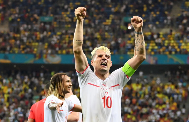 BUCHAREST, ROMANIA - JUNE 28: Granit Xhaka of Switzerland celebrates their side's victory in the penalty shoot out after the UEFA Euro 2020 Championship Round of 16 match between France and Switzerland at National Arena on June 28, 2021 in Bucharest, Romania.