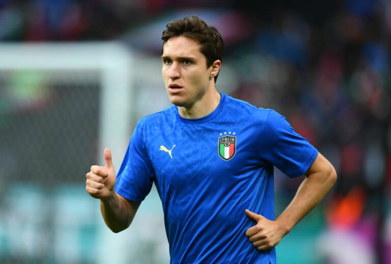 LONDON, ENGLAND - JULY 11: Federico Chiesa of Italy looks on as he warms up prior to the UEFA Euro 2020 Championship Final between Italy and England at Wembley Stadium on July 11, 2021 in London, England. (Photo by Claudio Villa/Getty Images)