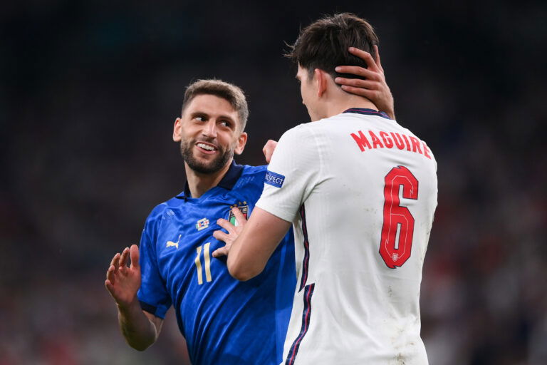 LONDON, ENGLAND - JULY 11: Domenico Berardi of Italy interacts with Harry Maguire of England during the UEFA Euro 2020 Championship Final between Italy and England at Wembley Stadium on July 11, 2021 in London, England. (Photo by Laurence Griffiths/Getty Images)