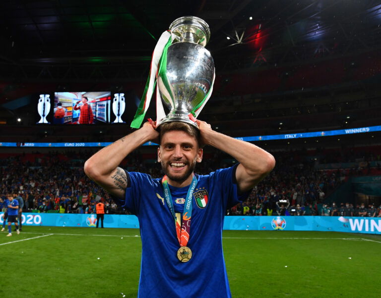 LONDON, ENGLAND - JULY 11: Domenico Berardi of Italy celebrates with The Henri Delaunay Trophy following his team's victory in the UEFA Euro 2020 Championship Final between Italy and England at Wembley Stadium on July 11, 2021 in London, England.