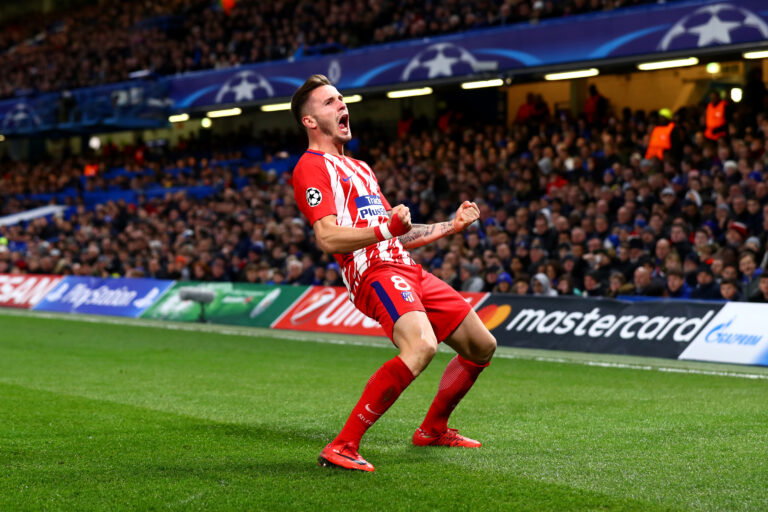 LONDON, ENGLAND - DECEMBER 05: Saul Niguez of Atletico Madrid celebrates after scoring his sides first goal during the UEFA Champions League group C match between Chelsea FC and Atletico Madrid at Stamford Bridge on December 5, 2017 in London, United Kingdom.