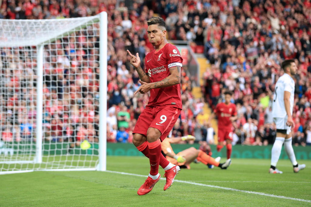 LIVERPOOL, ENGLAND - AUGUST 09: Roberto Firmino of Liverpool celebrates after scoring their 2nd goal during the pre-season friendly match between Liverpool and Osasuna at Anfield on August 9, 2021 in Liverpool, England. (Photo by Simon Stacpoole/Offside/Offside via Getty Images)