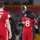 WOLVERHAMPTON, ENGLAND - MARCH 15: Jurgen Klopp, Manager of Liverpool celebrates victory with Naby Keita of Liverpool following the Premier League match between Wolverhampton Wanderers and Liverpool at Molineux on March 15, 2021 in Wolverhampton, England. Sporting stadiums around the UK remain under strict restrictions due to the Coronavirus Pandemic as Government social distancing laws prohibit fans inside venues resulting in games being played behind closed doors. (Photo by Laurence Griffiths/Getty Images)