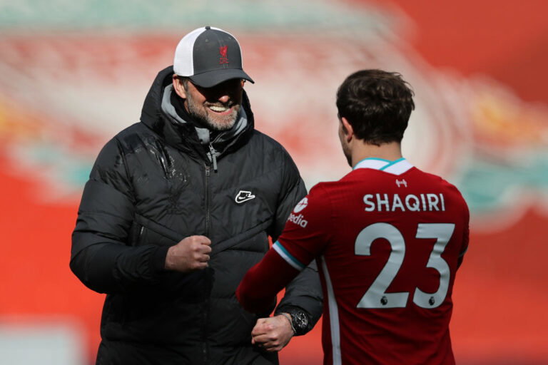 LIVERPOOL, ENGLAND - APRIL 10: Juergen Klopp, Manager of Liverpool celebrates with Xherdan Shaqiri following the Premier League match between Liverpool and Aston Villa at Anfield on April 10, 2021 in Liverpool, England. Sporting stadiums around the UK remain under strict restrictions due to the Coronavirus Pandemic as Government social distancing laws prohibit fans inside venues resulting in games being played behind closed doors. (Photo by Clive Brunskill/Getty Images)