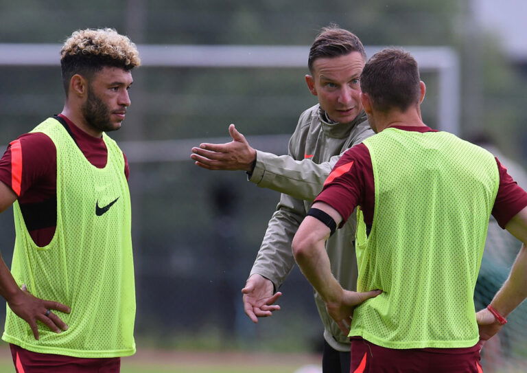 UNSPECIFIED, AUSTRIA - JULY 16: Pepijn Lijnders of Liverpool talks with Alex Oxlade-Chamberlain of Liverpool and James Milner of Liverpool of Liverpool during a training session on July 16, 2021 in UNSPECIFIED, Austria. (Photo by John Powell/Liverpool FC via Getty Images)