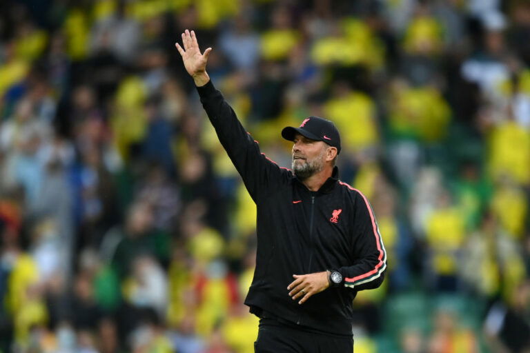 NORWICH, ENGLAND - AUGUST 14: Jurgen Klopp, Manager of Liverpool acknowledges the fans following victory in the Premier League match between Norwich City and Liverpool at Carrow Road on August 14, 2021 in Norwich, England. (Photo by Shaun Botterill/Getty Images)