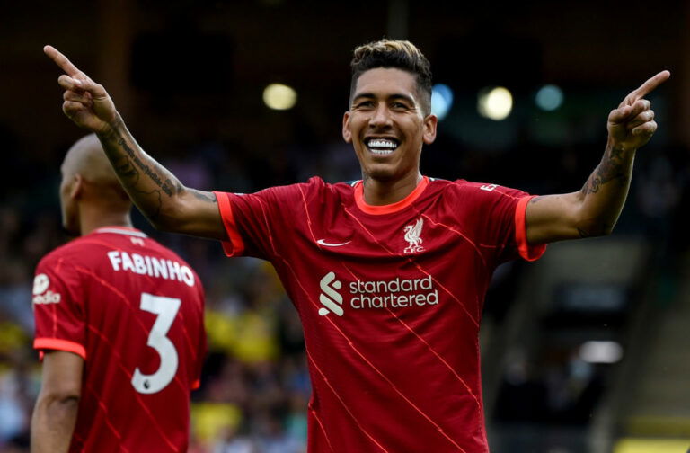 NORWICH, ENGLAND - AUGUST 14: (OUT, THE SUN ON SUNDAY OUT) Roberto Firmino of Liverpool celebrates after scoring the second goal during the Premier League match between Norwich City and Liverpool at Carrow Road on August 14, 2021 in Norwich, England. (Photo by John Powell/Liverpool FC via Getty Images)