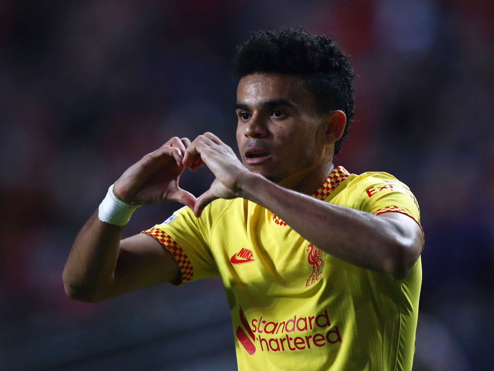 Soccer Football - Champions League - Quarter Final - First Leg - Benfica v Liverpool - Estadio da Luz, Lisbon, Portugal - April 5, 2022 Liverpool's Luis Diaz celebrates scoring their third goal REUTERS/Pedro Nunes