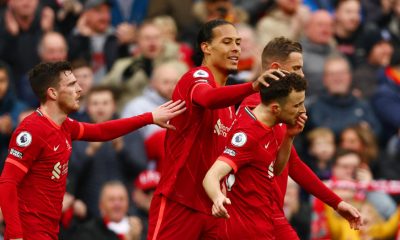LIVERPOOL, ENGLAND - APRIL 02: Diogo Jota of Liverpool celebrates with teammates (L-R) Andrew Robertson, Virgil van Dijk and Jordan Henderson after scoring their team's first goal during the Premier League match between Liverpool and Watford at Anfield on April 02, 2022 in Liverpool, England. (Photo by Clive Brunskill/Getty Images)