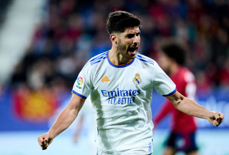 PAMPLONA, SPAIN - APRIL 20: Marco Asensio of Real Madrid celebrates after scoring his team's second goal during the LaLiga Santander match between CA Osasuna and Real Madrid CF at Estadio El Sadar on April 20, 2022 in Pamplona, Spain. (Photo by Juan Manuel Serrano Arce/Getty Images)