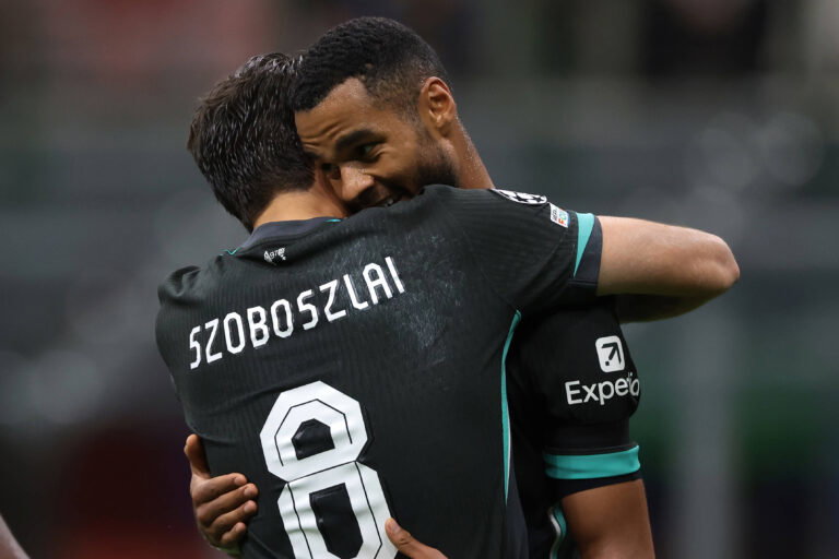 Milan, Italy, 17th September 2024. Dominik Szoboszlai of Liverpool FC celebrates with team mate Cody Gakpo after scoring