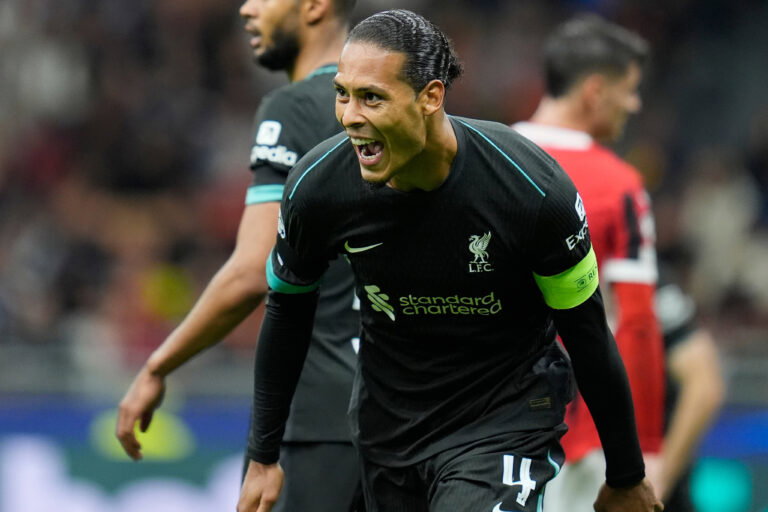Virgil van Dijk of Liverpool FC celebrates after scoring during the Uefa Champions League match between AC Milan and Liv