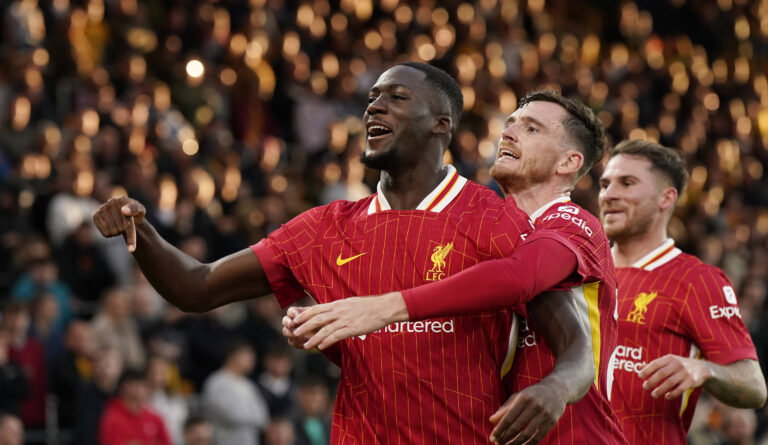 Wolverhampton, England, 28th September 2024. Ibrahima Konate of Liverpool (L) celebrates after scoring the opening goal