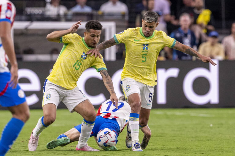 Bruno Guimaraes and Joao Gomes from Brazil during the game between Paraguay and Brazil in the group stage of the Copa Am