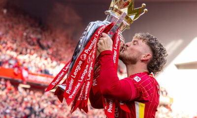 Harvey Elliott celebrating with the Premier League trophy in May 2025